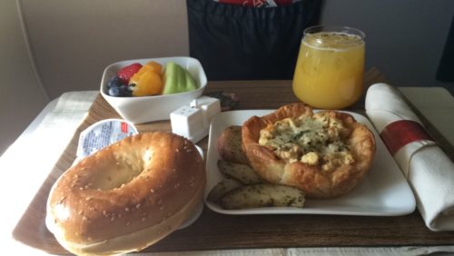 a plate of food and a drink on a table