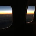 a view of the sunset from a plane window