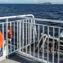 a white railing on a boat