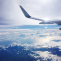 an airplane wing in the sky