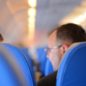 a man sitting in a plane
