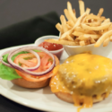 a plate of food with fries and burger