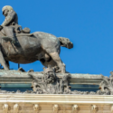 a statue of a man riding a horse