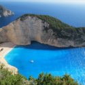 a beach with a boat in the water