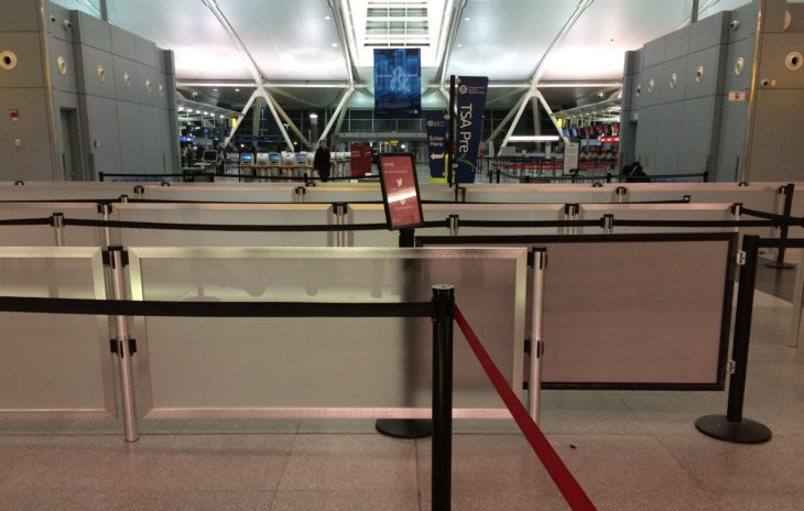 a red rope around a barrier