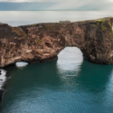 a large rock formation in the water