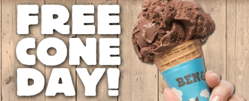 a hand holding a chocolate ice cream cone