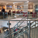 a spiral staircase with a group of people