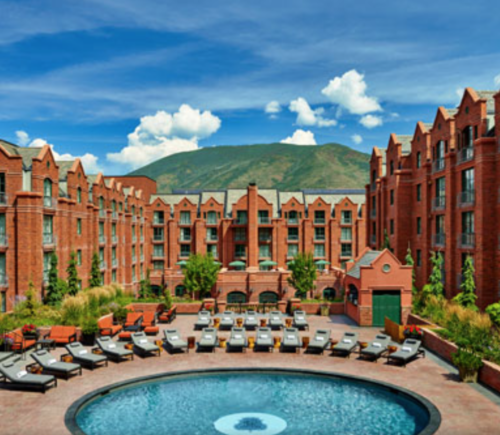 a pool in a courtyard of a hotel