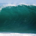 a large wave with white foam