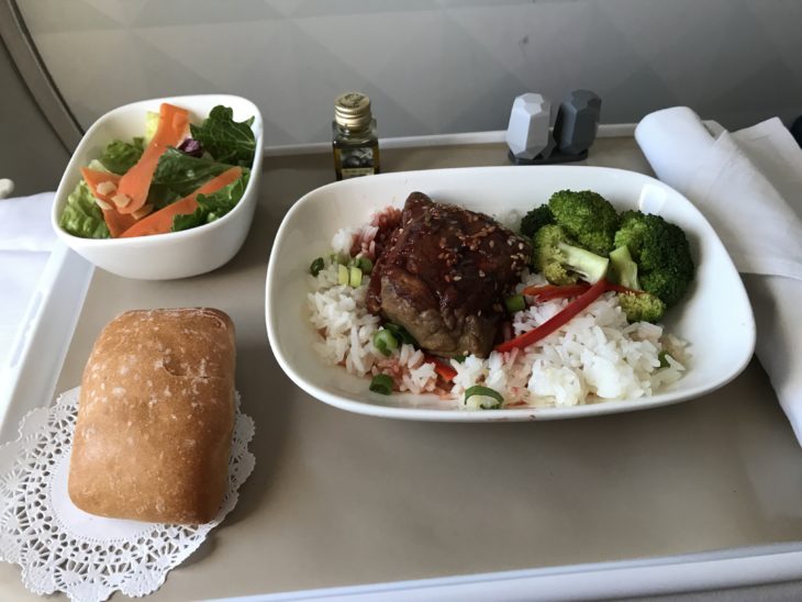 a plate of food on a tray