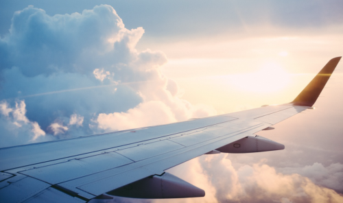 the wing of an airplane in the sky