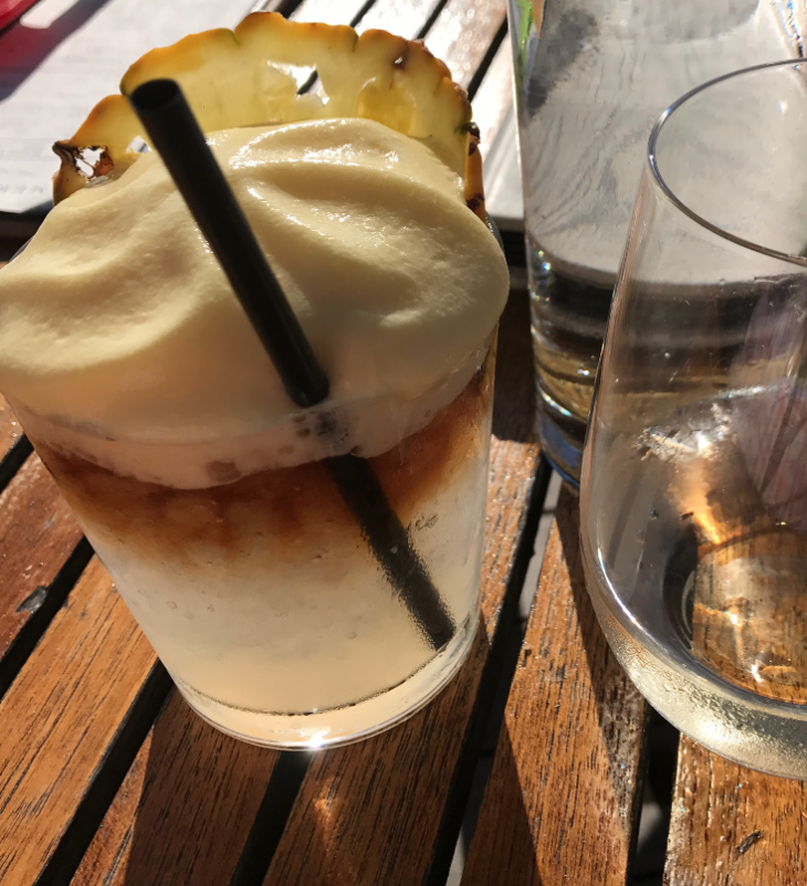 a drink with a straw on a table