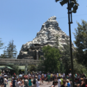 a group of people in front of Matterhorn Bobsleds