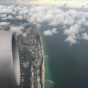 an aerial view of a city and water