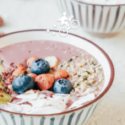 a bowl of food with fruit