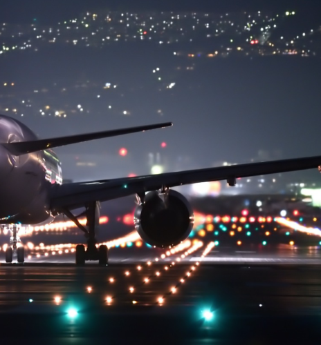 an airplane on the runway at night