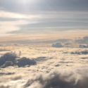 clouds and sun shining through the clouds