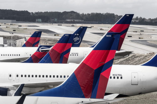 airplanes parked at an airport