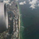 an aerial view of a city and water