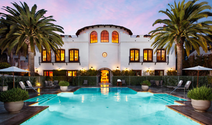 a pool in front of a building