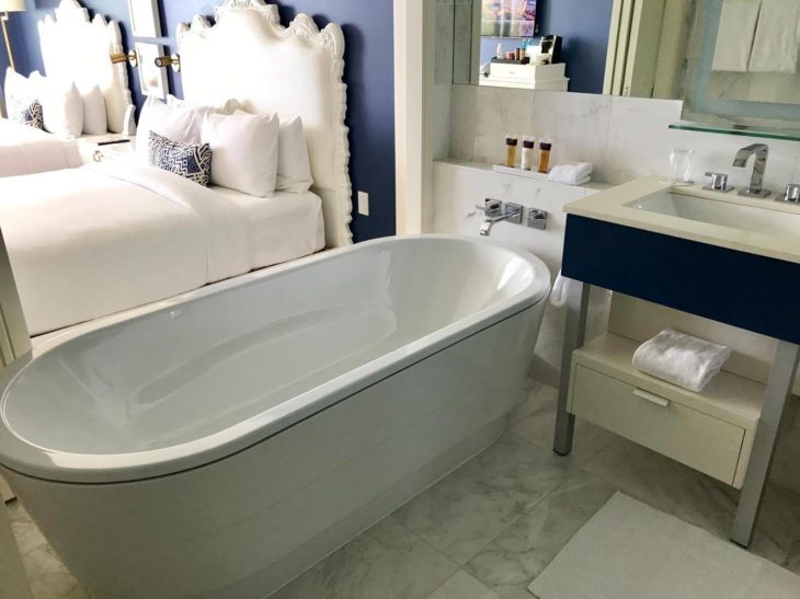 a bathroom with a bathtub and a sink