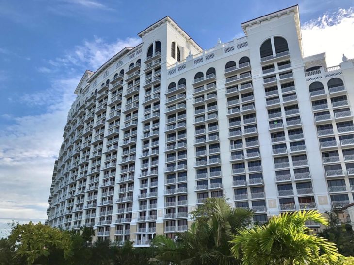 a large white building with many balconies