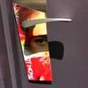 a door handle with a poster on it