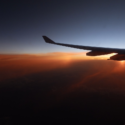 an airplane wing in the sky