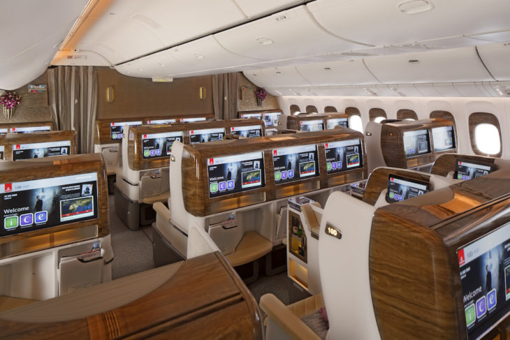 a plane with many seats and monitors