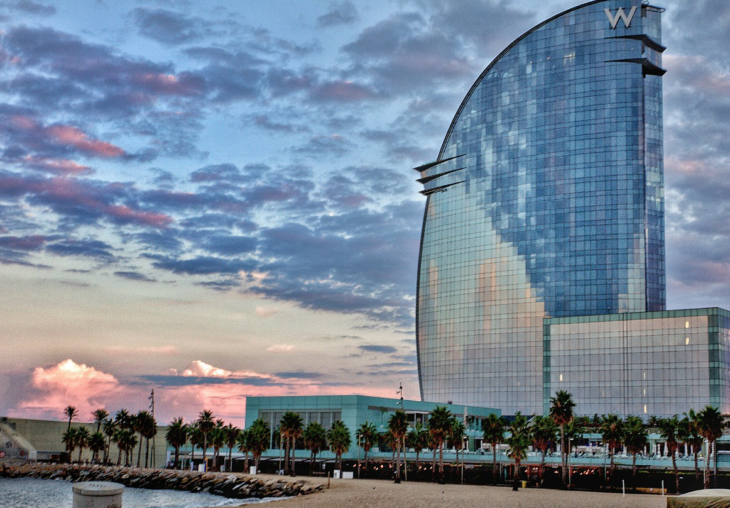 a building with a circular glass facade