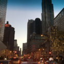 a city street with cars and buildings