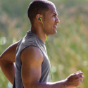 a man running with headphones