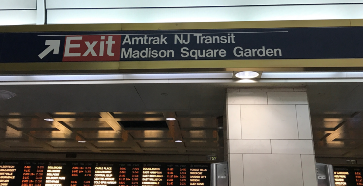a sign with a train schedule