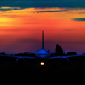 an airplane at sunset