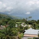 a view of a village and mountains