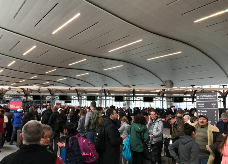 a group of people in a large room