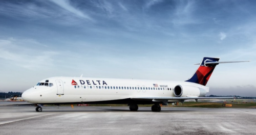a delta airplane on the runway