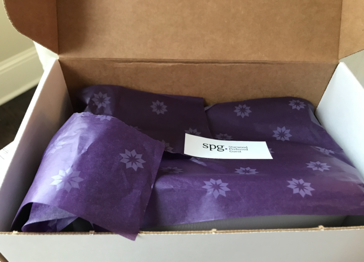 a box with purple wrapping paper