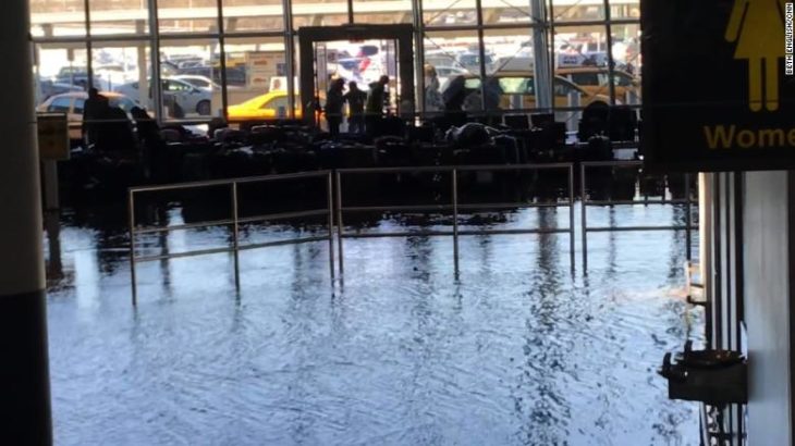 a flooded building with luggage