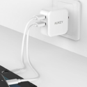 a charger plugged into a wall