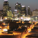 a city at night with many buildings