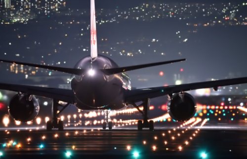 a plane on a runway at night