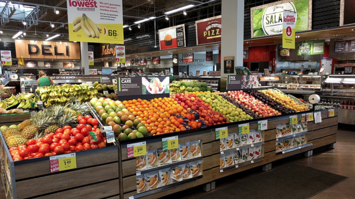 a grocery store with fruits and vegetables