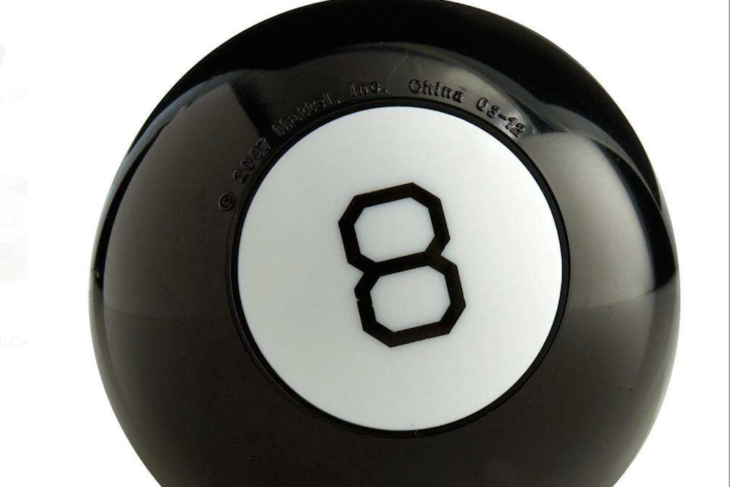 a black and white pool ball with a number