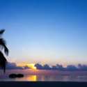 a sunset over a beach