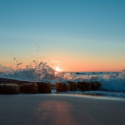 waves crashing waves on a beach