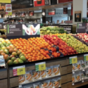 a grocery store with lots of fruits