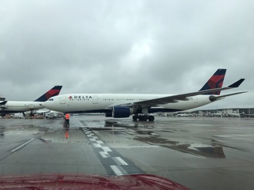 a large airplane on a wet runway