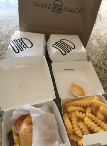 a group of white boxes with food in them